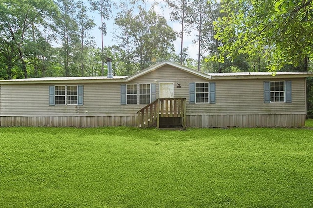 16940 Gunboat Landing Rd, Livingston, LA 70449 - manufactured / mobile home featuring a front yard