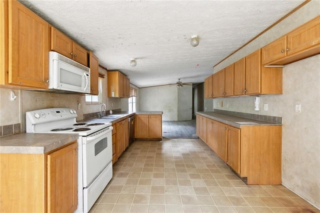 16940 Gunboat Landing Rd, Livingston, LA 70449 - kitchen with white appliances, a ceiling fan, a sink, light tile patterned floors, and a textured ceiling