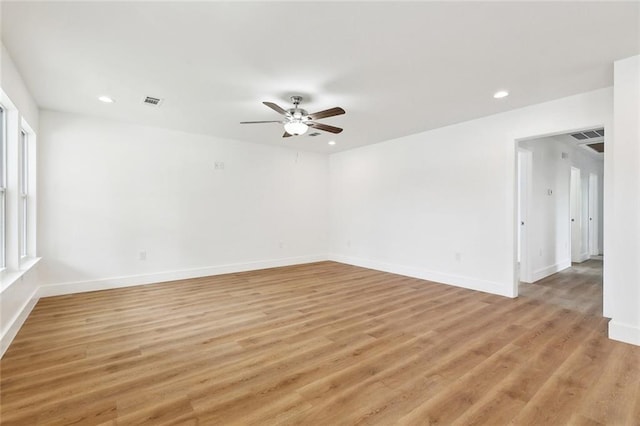 2305 Weyer St, Gretna, LA 70053 - empty room featuring ceiling fan, baseboards, recessed lighting, and light wood-style floors