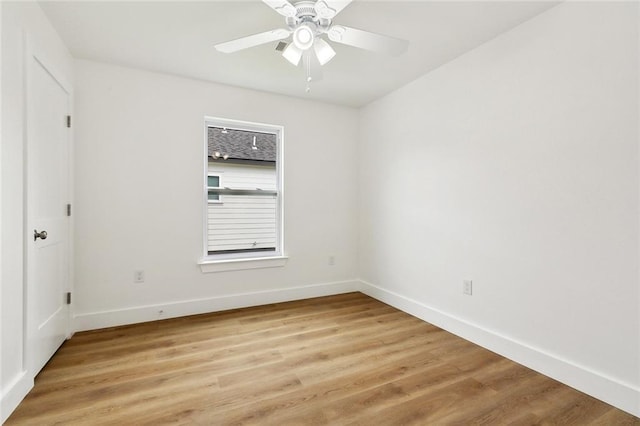 2305 Weyer St, Gretna, LA 70053 - empty room featuring baseboards, light wood finished floors, and ceiling fan
