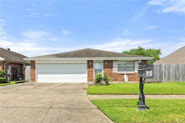 1816 Giuffrias Ave, Metairie, LA 70001 - view of front of home with driveway, a garage, and brick siding