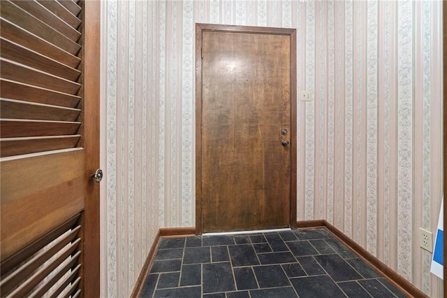 1816 Giuffrias Ave, Metairie, LA 70001 - doorway to outside with wallpapered walls and baseboards