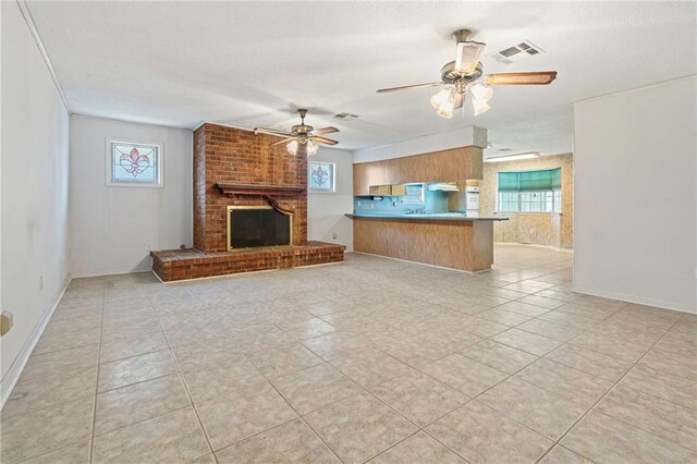 1816 Giuffrias Ave, Metairie, LA 70001 - unfurnished living room with ceiling fan, light tile patterned floors, baseboards, and a fireplace