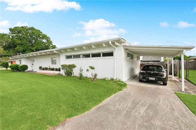 1501 Poinsettia Dr, Metairie, LA 70005 - view of home's exterior with driveway and an attached carport