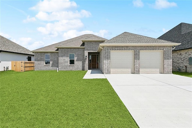 156 Mallard Dr, Westwego, LA 70094 - view of front of property featuring an attached garage, brick siding, concrete driveway, and roof with shingles