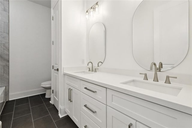 156 Mallard Dr, Westwego, LA 70094 - full bath with double vanity, toilet, tile patterned flooring, and baseboards