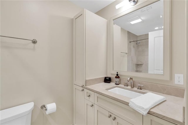 220 Decatur St Unit 302, New Orleans, LA 70130 - full bathroom featuring toilet, vanity, and a shower
