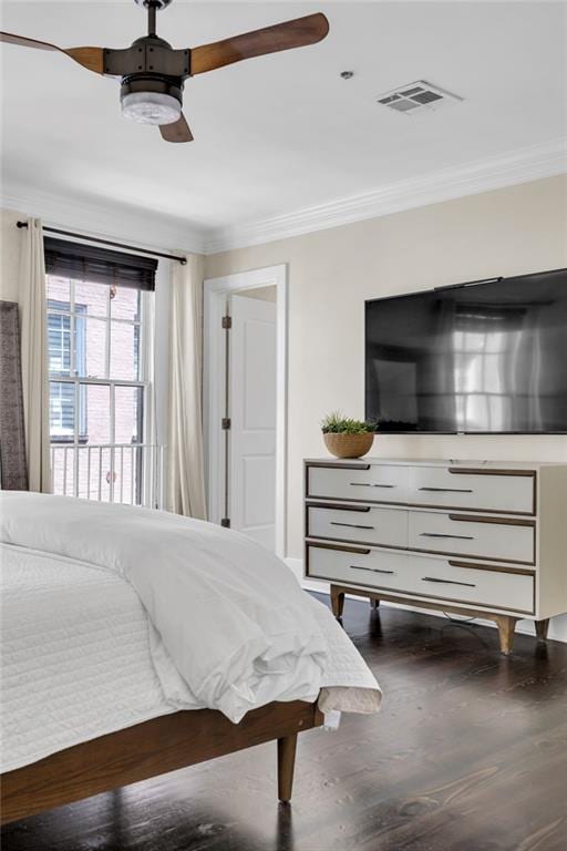 220 Decatur St Unit 304, New Orleans, LA 70130 - bedroom featuring crown molding, wood finished floors, and ceiling fan
