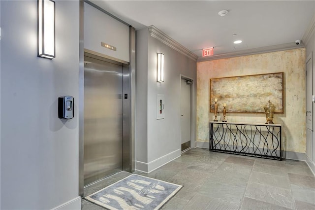 220 Decatur St Unit 304, New Orleans, LA 70130 - corridor with baseboards, ornamental molding, elevator, and recessed lighting