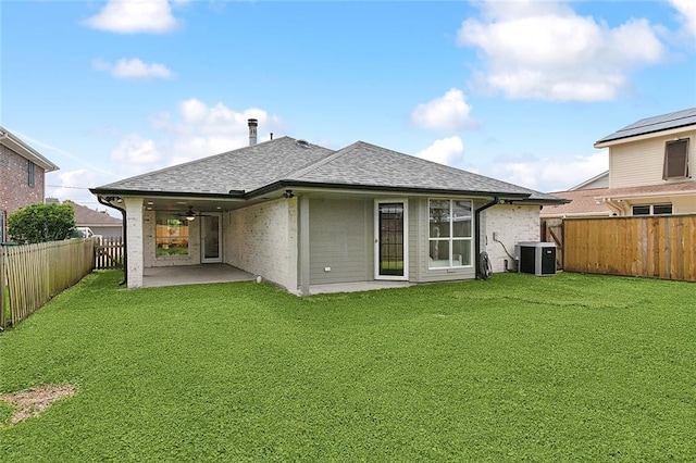 4721 Chastant St, Metairie, LA 70006 - rear view of property with a shingled roof, a patio area, and central AC