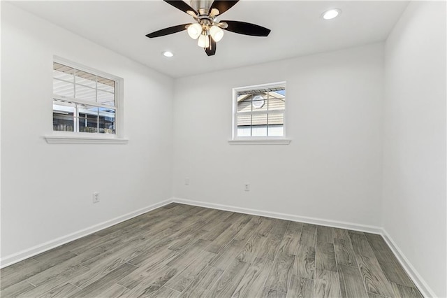 7504 Birch St, Violet, LA 70092 - unfurnished room with wood finished floors, a ceiling fan, baseboards, and recessed lighting