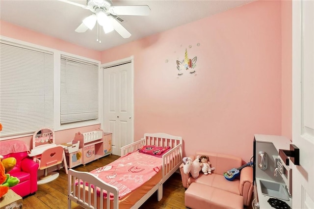 67 Cochrane Dr, Chalmette, LA 70043 - bedroom with hardwood / wood-style floors, a closet, and a ceiling fan