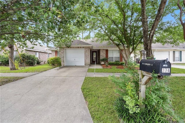 374 E Suncrest Loop, Slidell, LA 70458 - view of front facade featuring driveway, brick siding, a garage, and a front lawn