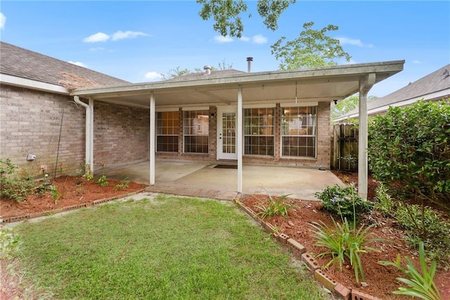 374 E Suncrest Loop, Slidell, LA 70458 - rear view of house with brick siding and a patio