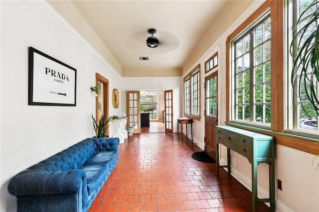 1500 Camp St, New Orleans, LA 70130 - interior space with a ceiling fan, healthy amount of natural light, and baseboards