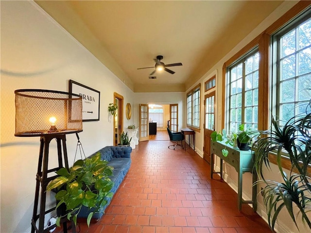 1500 Camp St, New Orleans, LA 70130 - sunroom / solarium featuring tile patterned floors and baseboards