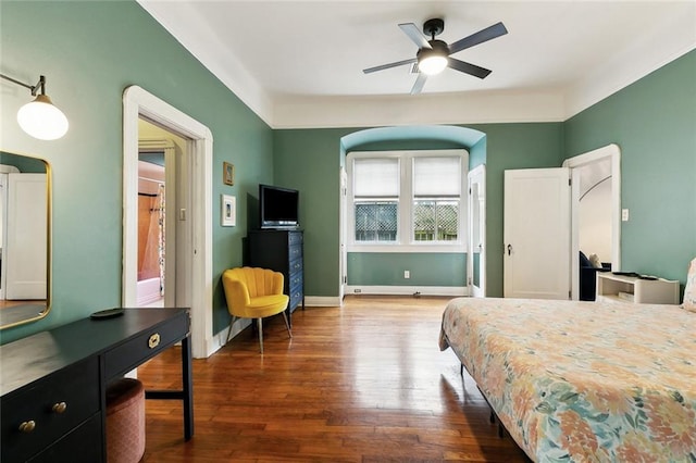 1500 Camp St, New Orleans, LA 70130 - bedroom featuring wood finished floors, baseboards, and ceiling fan