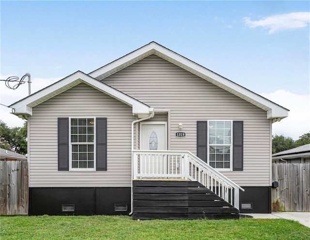 1319 Granada Dr, New Orleans, LA 70122 - back of house featuring crawl space