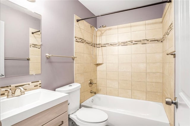 1319 Granada Dr, New Orleans, LA 70122 - full bath featuring toilet, shower / bathtub combination, vanity, and tasteful backsplash
