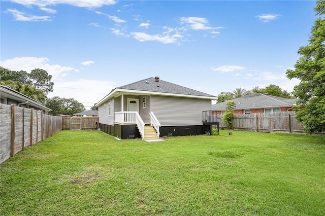 1319 Granada Dr, New Orleans, LA 70122 - view of rear view of house
