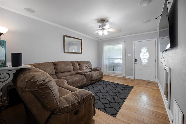 3620 Arizona Ave, Kenner, LA 70065 - living area featuring light wood-style flooring, ceiling fan, crown molding, and baseboards