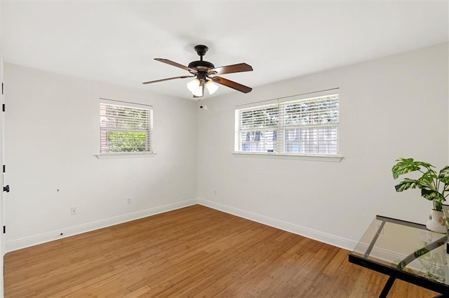 228 W Kenilworth-A St, New Orleans, LA 70124 - spare room with baseboards, light wood finished floors, and ceiling fan