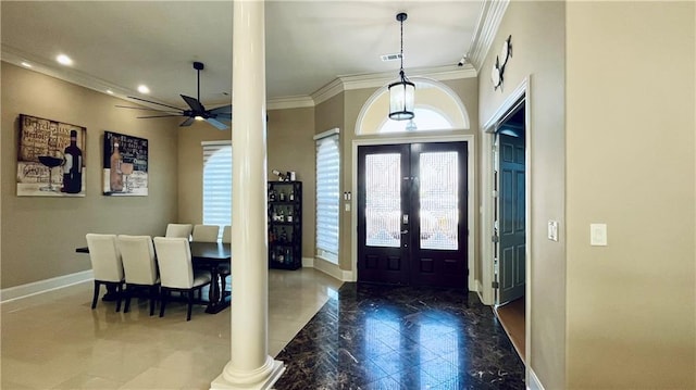2097 S Lakeshore Blvd, Slidell, LA 70461 - entryway with ornamental molding, baseboards, decorative columns, plenty of natural light, and a ceiling fan