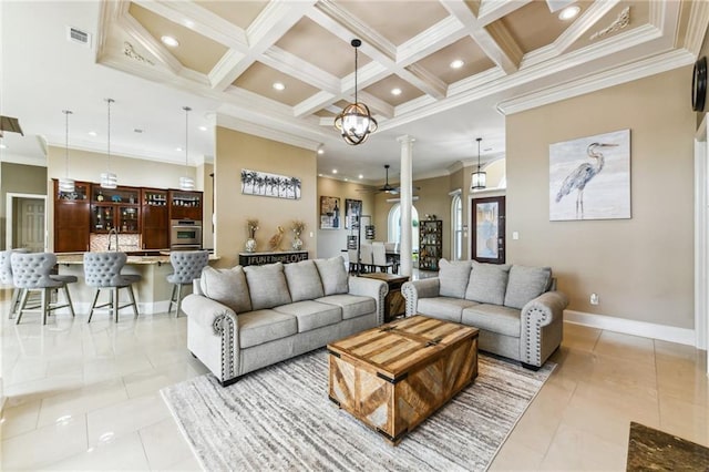 2097 S Lakeshore Blvd, Slidell, LA 70461 - living room with ornamental molding, baseboards, beam ceiling, coffered ceiling, and decorative columns