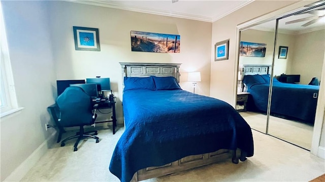 2097 S Lakeshore Blvd, Slidell, LA 70461 - carpeted bedroom with crown molding, a closet, and baseboards