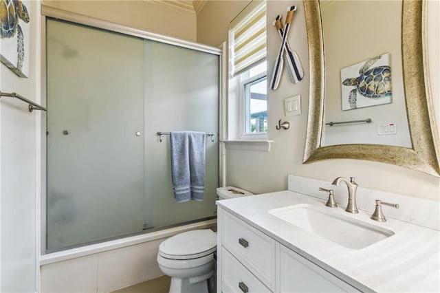 2097 S Lakeshore Blvd, Slidell, LA 70461 - full bath featuring toilet, vanity, enclosed tub / shower combo, and ornamental molding