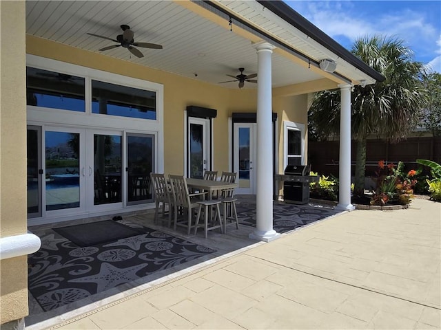 2097 S Lakeshore Blvd, Slidell, LA 70461 - view of patio / terrace with ceiling fan, a grill, and outdoor dining space
