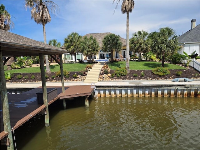 2097 S Lakeshore Blvd, Slidell, LA 70461 - dock area featuring a water view and a yard
