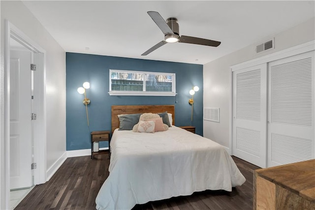2833 St Charles Ave Unit 16, New Orleans, LA 70115 - bedroom featuring wood finished floors, a closet, a ceiling fan, and baseboards