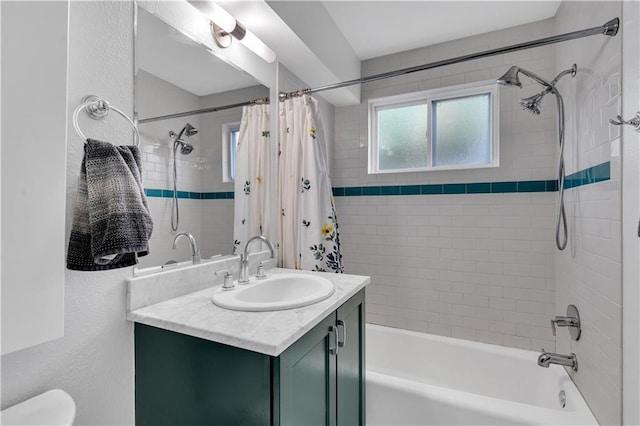 2833 St Charles Ave Unit 16, New Orleans, LA 70115 - bathroom featuring shower / bath combo, vanity, and toilet