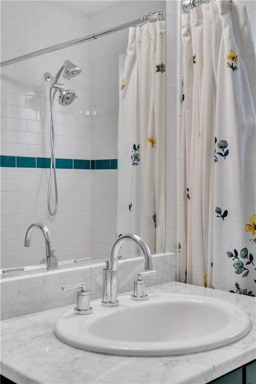 2833 St Charles Ave Unit 16, New Orleans, LA 70115 - full bathroom featuring vanity and a shower with curtain