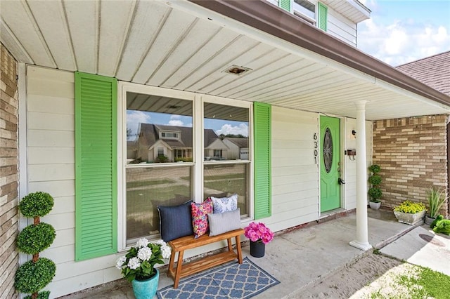 6301 Schouest St, Metairie, LA 70003 - view of exterior entry with a porch