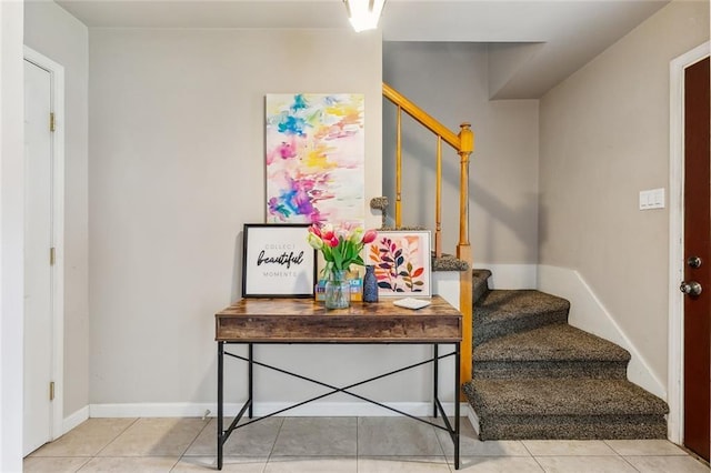 6301 Schouest St, Metairie, LA 70003 - stairs featuring tile patterned flooring and baseboards