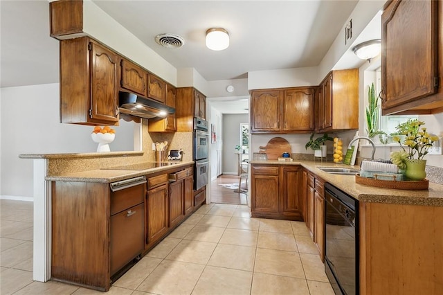6301 Schouest St, Metairie, LA 70003 - kitchen with black appliances, under cabinet range hood, light tile patterned flooring, tasteful backsplash, and brown cabinetry