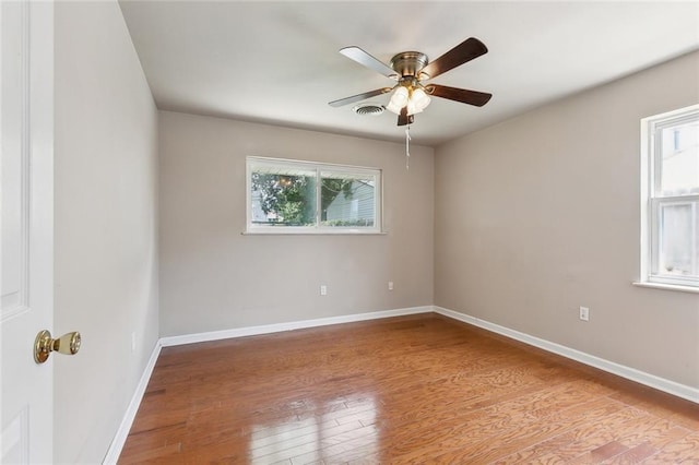 6301 Schouest St, Metairie, LA 70003 - empty room with light wood-style flooring, baseboards, and ceiling fan