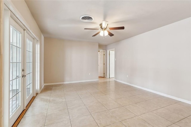 6301 Schouest St, Metairie, LA 70003 - empty room featuring light tile patterned floors and baseboards