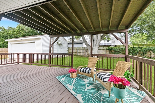 6301 Schouest St, Metairie, LA 70003 - wooden terrace with an outdoor structure and a garage
