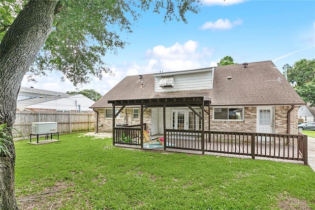 6301 Schouest St, Metairie, LA 70003 - back of house featuring brick siding, roof with shingles, french doors, and a patio