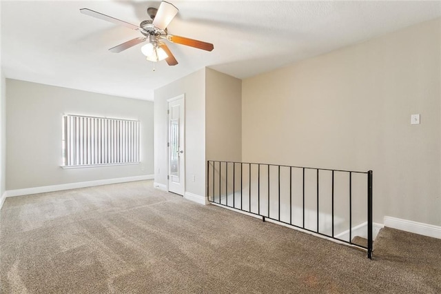 3805 Houma Blvd Unit A234, Metairie, LA 70006 - carpeted empty room featuring a ceiling fan and baseboards