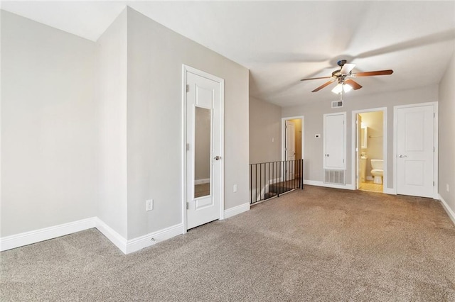 3805 Houma Blvd Unit A234, Metairie, LA 70006 - unfurnished bedroom with carpet floors, baseboards, and ensuite bathroom