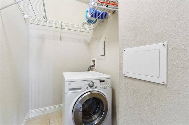 3805 Houma Blvd Unit A234, Metairie, LA 70006 - washroom featuring washer / dryer, baseboards, and tile patterned flooring