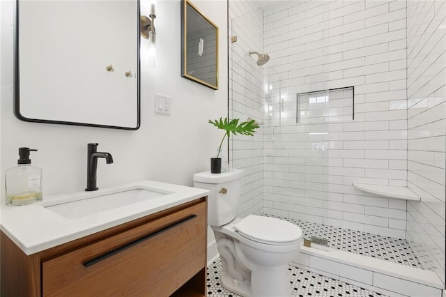 633 Tchoupitoulas St Unit 4, New Orleans, LA 70130 - full bathroom featuring toilet, tiled shower, and vanity