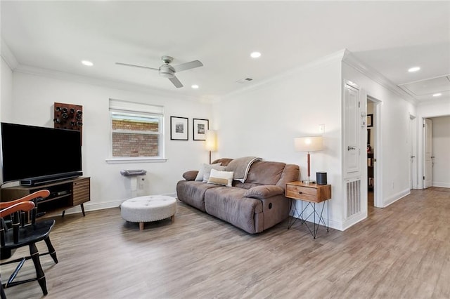 917 Belmont Pl, Metairie, LA 70001 - living area featuring a ceiling fan, light wood-style floors, recessed lighting, crown molding, and attic access