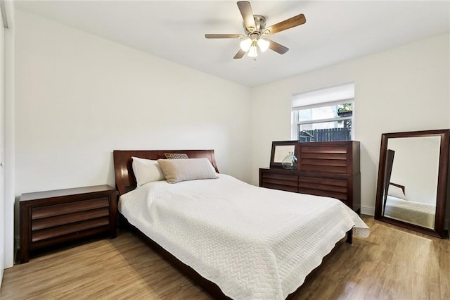 917 Belmont Pl, Metairie, LA 70001 - bedroom featuring wood finished floors and a ceiling fan