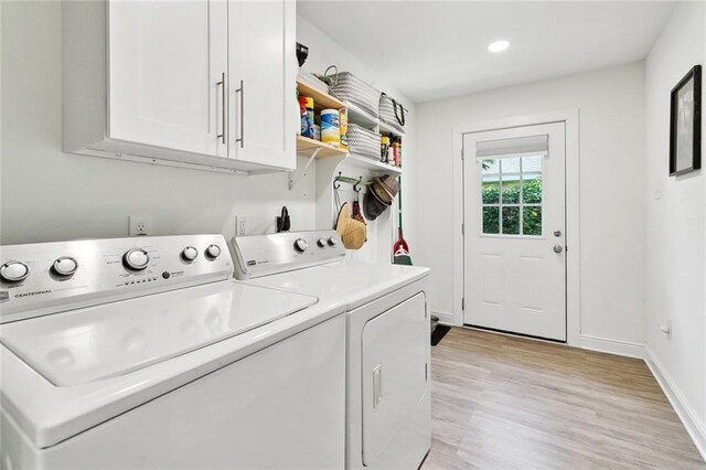 917 Belmont Pl, Metairie, LA 70001 - washroom with cabinet space, washer and dryer, light wood finished floors, and recessed lighting