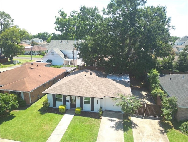 917 Belmont Pl, Metairie, LA 70001 - view of front facade with concrete driveway, a garage, and a residential view